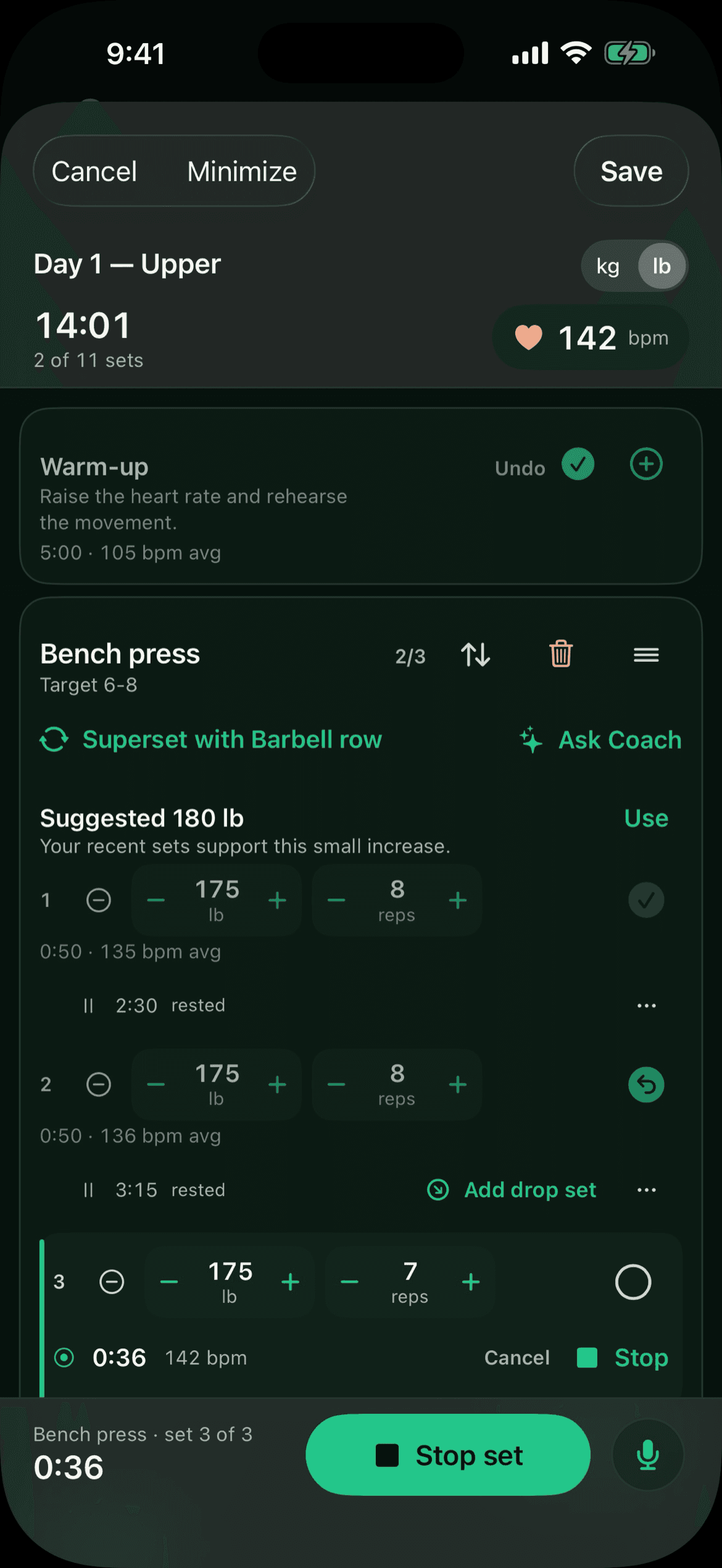 A live workout fourteen minutes in: Day 1 Upper in pounds, 2 of 11 sets done, heart rate 142 bpm, a finished warm-up at 105 bpm average, and bench press with 180 lb suggested, its first set logged at 175 lb for 8 reps at 135 bpm average, with a Stop set button at the bottom for set 3 of 3, 37 seconds in.
